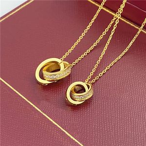 collana girocollo per le donne gioielli firmati catena d'oro doppio anello ellisse Micro zircone intarsiato clavicola acciaio al titanio Catene pendenti placcati oro rosa all'ingrosso