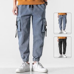 Mäns jeans överdimensionerade lastfjäder höstlös löst multi-pocket denim byxor manliga streetwear plus size Harlan casual trendiga pantsme