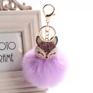 Chave anéis Fantasia Fantasia Novo coelho 8cm Fur Ball Fox Head Inclaid Pearl Rhinestone Car Kichain Bolsa Keyring G230526