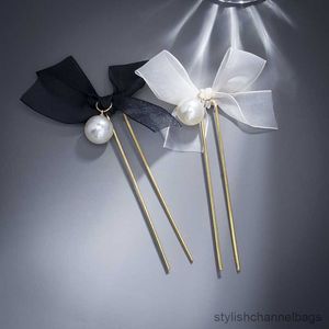 Outra moda Big Pearl Lace Ribbon Bow Sticks para mulheres Hair Metal Ponytailel