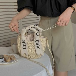 Straw Handbag Scarves Letters Cross Body Grass Woven Women s New Summer Portable Versatile Beach Bags Vacation Shoulder Bag 230529
