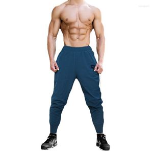 Pantaloni da uomo Vendita diretta in fabbrica Sezione sottile estiva da uomo Pantaloni sportivi slim da palestra traspiranti ad asciugatura rapida