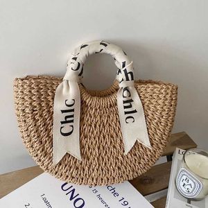 Designer Casual Vacanze Borse da spiaggia Lettera a spalla Sciarpa di seta Borsa portatile in paglia intrecciata Versatile semicircolare Borse da donna in rattan borse per la spesa borse portafogli