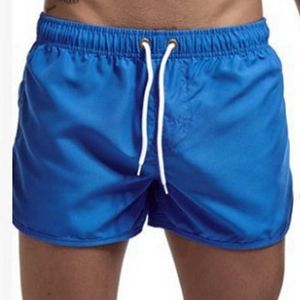 Mäns shorts Nya herrar fitness strand sommar gym träning kläder män och kvinnor andas sportkläder lösa och avslappnade jogging shorts aa230529