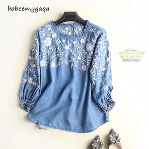 T-shirt broderi denim blus kvinnor ljus blå mjuka jeans blusar hem o nacke tre kvart ärm ruffles casual skjorta söt topp