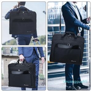 Designer-duffel väskor modoker plagg resväska med axel rem hängande resväska kläder affär flera fickor män bagage svart