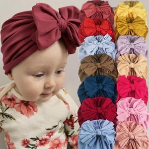 Şapkalar bahar büyük bowknot bebek şapka türban yumuşak pamuk kız kapaklar düz renk yürümeye başlayan çocuk bonnet beanies