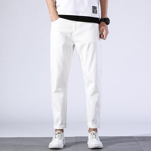 Pantaloni nuovi pantaloni bianchi da uomo casual alla moda vestibilità ampia matita pantaloni maschili elasticizzati in cotone coreano elasticizzato taglie forti pantaloni sottili da uomo