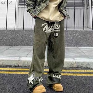 Herrbyxor män kvinnor avslappnade byxor nya trendiga varumärken American Street broderi lösa tröjor hip-hop par casual mode byxor tidvatten l230520