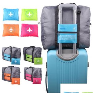 Sacos de armazenamento aeronaves de grande capacidade Trolley Travel Bag portátil Saco de nylon dobrando 46x34.5cm 4 cores Dh0492 Drop Delivery Home Gar Dhjzy