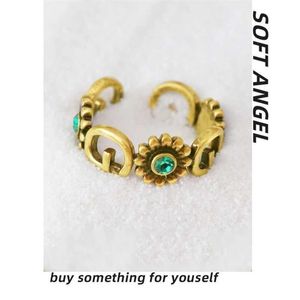 designer jewelry bracelet necklace Early sp gift ancient Ring Emerald with gold hollow metal texture light extravagant opening ring high quality