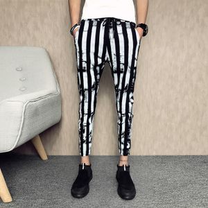 Calça homens moda joggers homens homens preto e branco listras listras masculinas slim casual cordas harém calças de streetwear masculino calça