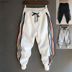 Herrbyxor homme mode hip hop streetwear män randiga lapptäcke harem byxor koreanska löst fit manschetterade jogger tröjor byxor för manlig l230520