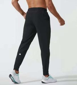 LL Calças compridas masculinas Jogger Sport Yoga Outfit Secagem rápida Cordão Ginásio Bolsos Calças de moletom Calças masculinas Casuais Cintura elástica fitness Novo estilo 33