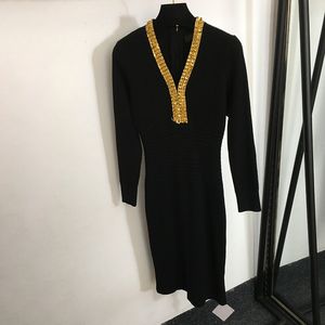 Abiti in maglia con scollo a V Abiti da donna Plus Gonne lunghe Abito con ornamenti in paillettes Abbigliamento classico a maniche lunghe da donna