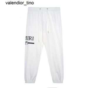 NY DESIGNER MENS PANTERS LETTERBETELA STÄNGA MÄNNINGAR KVINNA TRACKSUITER JOGGERS mode Märke Elastiska midja byxor Mens kvinnor byxa