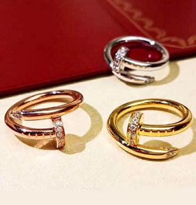 Acciaio inossidabile di alta qualità Oro argento oro rosa Anello per unghie amanti dei diamanti Anelli a fascia per donna Uomo Anelli per coppia gioielleria raffinata Logo3856154