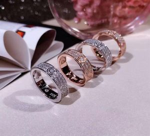 Роскошные дизайнерские дизайнерские ювелирные изделия Женские кольца Мужские обручальные кольца из стерлингового серебра 925 пробы Роскошные бриллиантовые розовые золотые подарки на помолвку8884806