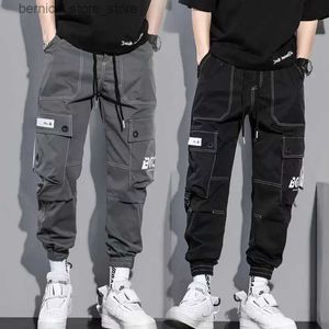 Men's Pants Classic Streetwear Casual Men Ribbons Harem Jogging Pants Male Slim Fit Spring Cargo Pants Multi-Pockets Women Trouser X95 Q231201