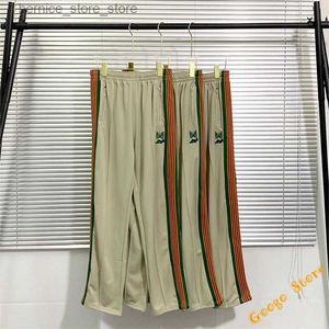 Calças masculinas High Street Casual AWGE Needles Sweatpants Corredores Coloridos Stripe Side Webbing Needles Calças Borboleta Bordado Calças AWGE Q231201