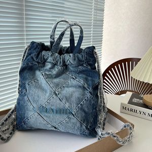 Franska kvinnors gradient denim cowboy dragstring ryggsäckväskor topphandtag tote shopping quiltad handväska stor kapacitet utomhus sacoche axel handväskor 30x35 cm