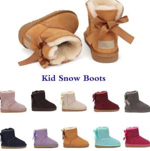 UG G Nuovi stivali Bambini Australia Scarponi da neve Designer Scarpe per bambini Inverno Classico Ultra Mini Bottone Neonati maschi Stivaletti alla caviglia Pelliccia per bambini Marchio