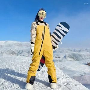Skidbyxor Herrarna för kvinnors snöhaklappar Justerbara snowboardar utomhusvattentäta isolerade skidbyxor
