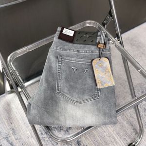 Mäns designer jeans Nya 2023 Spring och Autumn Winter Light Luxury Calf Elastic Trend Men and Women Metal Letter Jeans