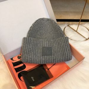 Designer-Marken-Herren-Luxus-Beanie-Mütze für Damen, neuer Herbst- und Winter-Modetrend, klassisches Lächeln, warme, lässige Outdoor-Mütze.