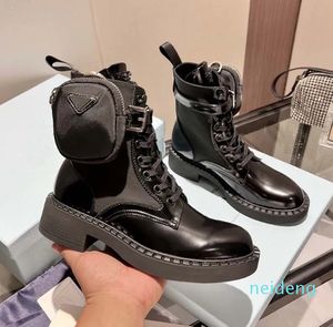 Fashionable womenswear designer Rois Boots Ankle Martin Boots and Nylon Boot military inspired combat cloth bag attached to the