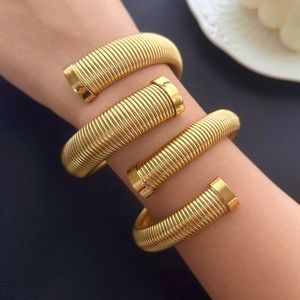 Fashionable minimalist striped open cross bracelet, high-end stainless steel plated with real gold, European and American fashion style bracelet