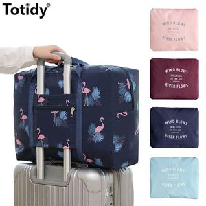 2021 Maletas Bolsas de viaje plegables de nailon Bolsa de gran capacidad unisex Equipaje Bolsos impermeables para mujeres Organizador de ropa para hombres 290q