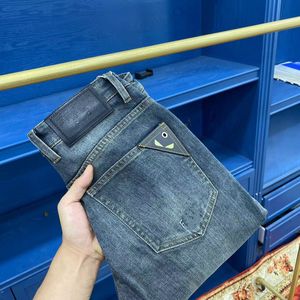 Jeans da uomo firmati Jeans viola High Street Letter Patch Pantaloni da donna con pannello ricamato con stella Pantaloni slim fit elasticizzati