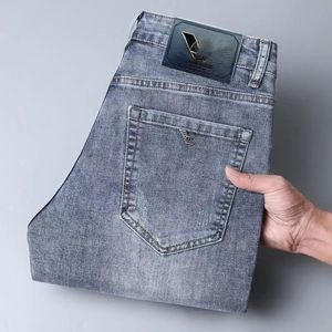 Designer Męskie dżinsy fioletowe dżinsy High Street Metal Letter Patch Men's Women's Star Haftowane spodnie panelowe rozciągnięte szczupłe spodnie