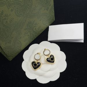 Designer designs minimalist earrings that appeal to women and are stylish high-end and atmospheric. Valentines Day gift box