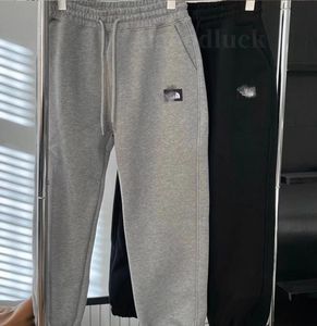 Designer North kleines Label bestickte gepolsterte Hose warme und bequeme Jogginghose Freizeithose Männer und Frauen vielseitiger Trend Winterpaar