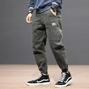 Męskie dżinsy moda uliczna mężczyźni szara duża kieszonkowa Projektowana designerska swobodne spodnie cargo joggery hombre hip hop joggers luźne spodni haremu 231204