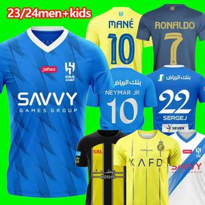 23 24 Maglie da calcio Al Nassr FC Ronaldo 2023 2024 Home giallo via CR7 Mane Gonzalo Martinez Talisca donne FANS versione giocatore uomo bambini kit Maglia da calcio 16-2XL