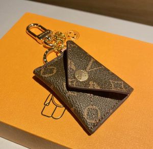 Güzel Mücevher Anahtarları Koruma Tasarımcı Anahtar Zinciri Lüks Cazibe Mektup Çantaları Lady Anahtar Yüzük Araç Ana Zincir Kolye Orijinal Kutu Kadınlar Kadınlar İçin