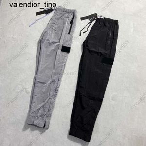 Męskie spodnie marki projektanta kamienna marka mody kolory wyspę wiosenne nylon refleksyjny joggers cargo streetwearne spodnie męskie spodnie damskie