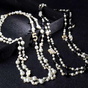 Kvinnliga långa kedjor skiktade pärlpärlpärlor halsband krage de moda nummer 5 blommor party smycken2198