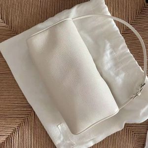 5A KVALITET Raden 90 -tal Lolita Armpit Pochette Designer Väskor Kvinnor Luxury Mens äkta läder axelväskor Koppling blixtlås crossbody totes mode underarm handväska