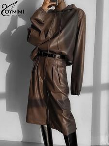 Kvinnors tvåbitar byxor Oymimi Fashion Brown Pu Leather 2 Set Outfit 2023 Winter Long Sleeve Hooded Shirt With High midje Kvinna 231206