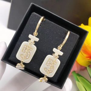 Perfume bottle earrings CHAN 5 No.5 Lucky New stud earrings in Luxury fine jewelry chain necklace for womens pendant k Gold Heart Designer LES INFINIS DE CAMELIAa