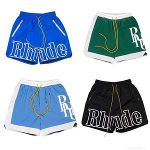 Projektanci szorty Rhude Summer Fashion Beach Pants Men High Quality Street Wear Red Blue Black Purple Mens Short ZvZB