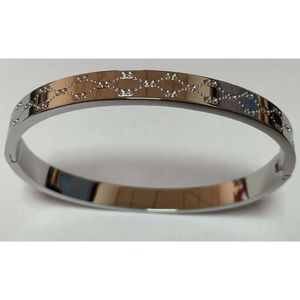 Designerarmband smycken Guldarmband Banglered och grön dubbelfärg CLAP Lovers Korean version Fashion Titanium Steel