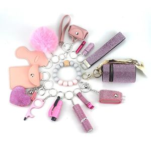 Keychains Lanyards 15pcs Portable Lipstick Masonry Defense Women Outdoor Fur ball pendant Keychain Set Key ring With Cylinder storage bag 231205