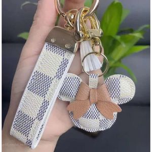 Designer Schlüsselanhänger Geldbörse Schlüsselanhänger Geldbörse Anhänger Autokette Charm Eimertasche Blume Mini Münzhalter Schlüsselanhänger Tasche Schmuck Geschenke Zubehör 314