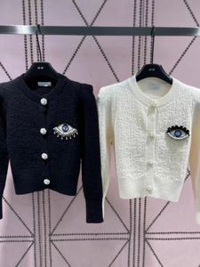 New design women's o-neck single breasted eye embroidery pattern knitted sweater cardigan SMLXL