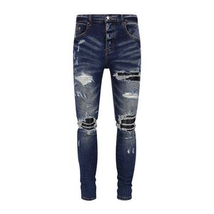 designer amirssNew High Street Trendy Brand Patch in pelle rotta Jeans elasticizzati slim fit invecchiati blu profondo per uomo